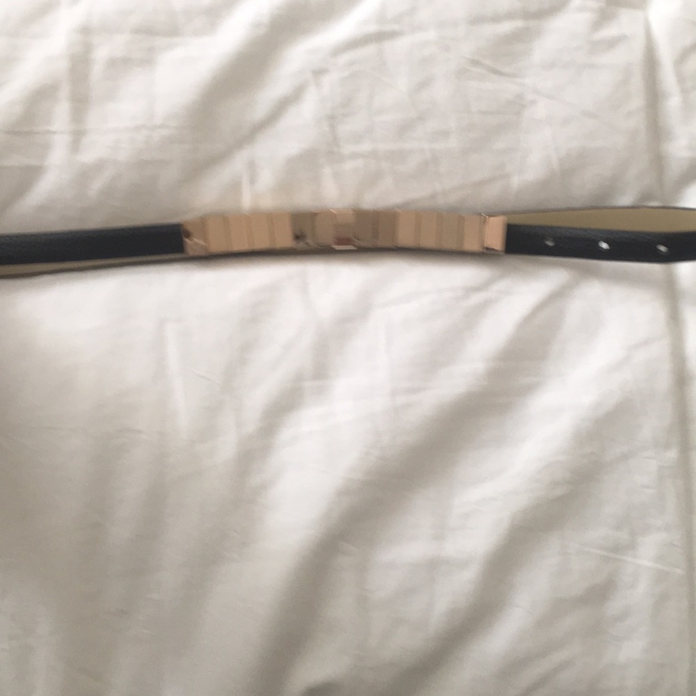 Black leather and gold metal belt. Bcbgeneration S